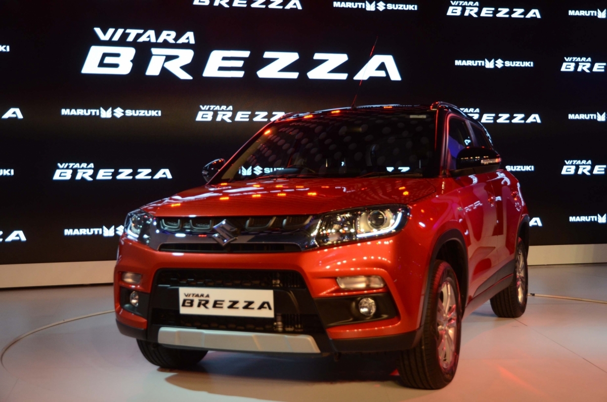 The new Vitara Brezza displayed at the Maruti Suzuki stall during the Auto Expo 2016 in Noida on Feb 3, 2016. maruti suzuki vitara brezza sales september domestic exports models share price