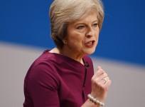 Theresa May tells Conservatives its time to embrace a new centre ground