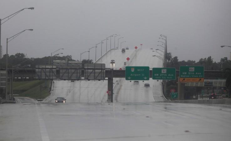 Drivers make their way on an empty highway prior to the arrival of Hurricane Matthew in Miami Beach.