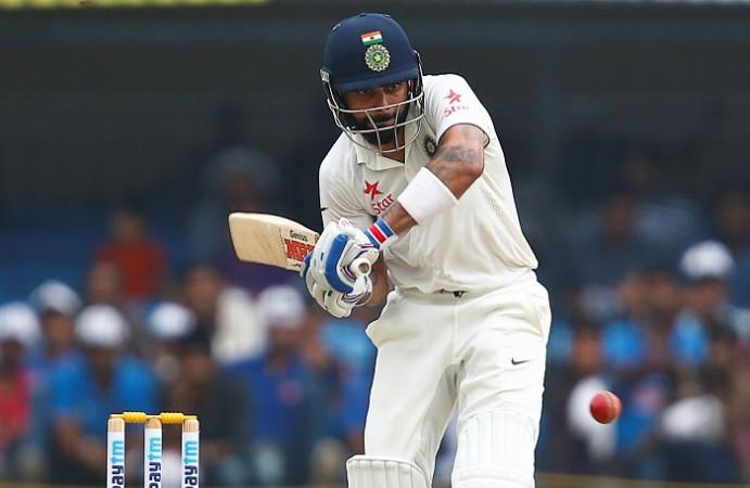 Eyes firmly on the ball for India captain Virat Kohli on day one of the third Test against New Zealand, October 8, 2016 Virat Kohli India