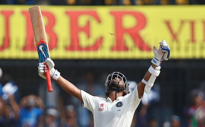 India batsman Ajinkya Rahane celebrates after completing his century on day two of the third Test match against New Zealand, October 9, 2016 Ajinkya Rahane India