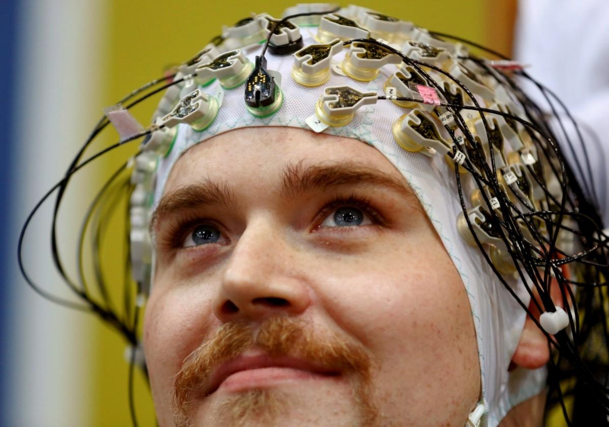 Sebastian Reul of Germany looks up as he competes during the Brain-Computer Interface Race (BCI) at the Cybathlon Championships in Kloten, Switzerland October 8, 2016. CYBATHLON
