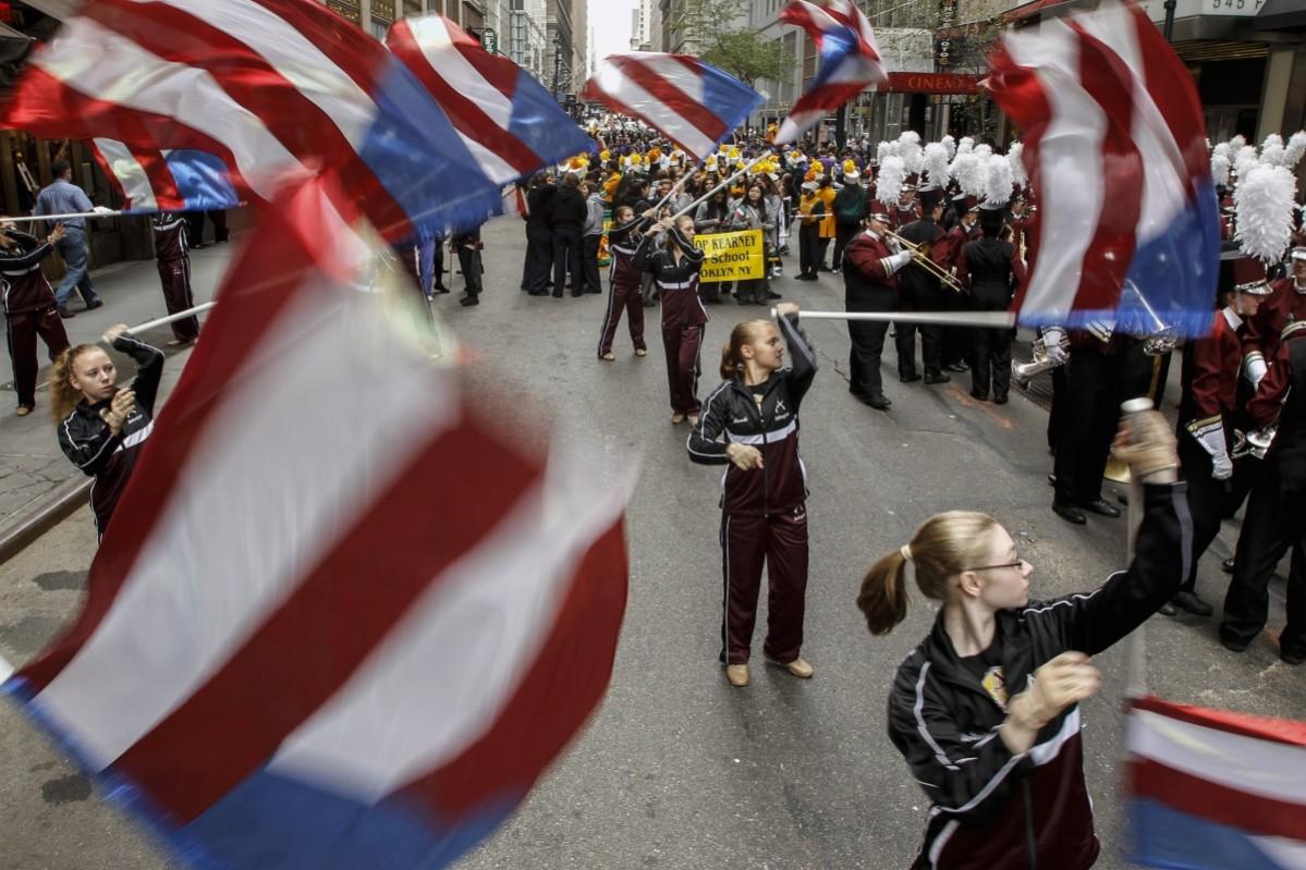 Revellers take part in the 70th Annual Columbus Day Parade in New York, October 13, 2014. Columbus Day Parade