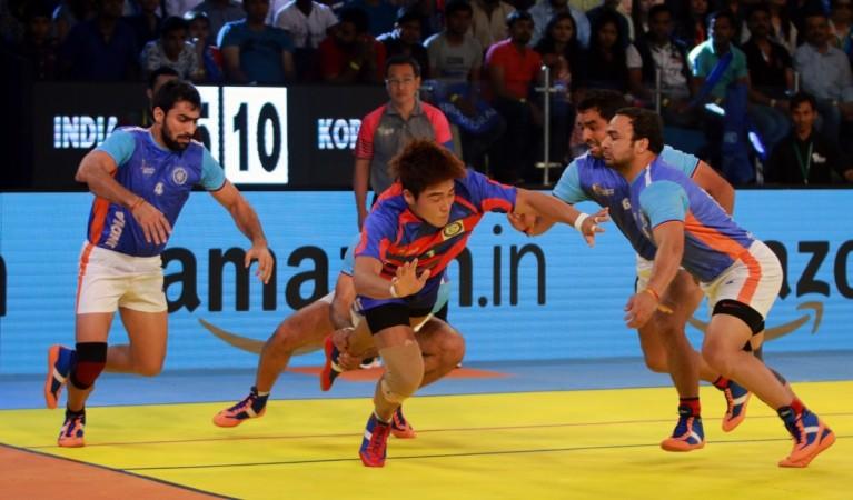 Indian kabaddi team in action against South Korea in the tournament kabaddi