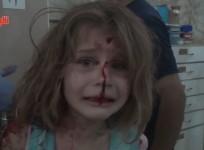 Syria: Little girl cries for her dad after an airstrike in Talbiseh