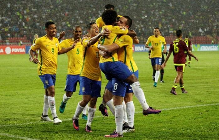Brazil players celebrate after scoring a goal against Venezuela, October 11, 2016 Brazil Venezuela