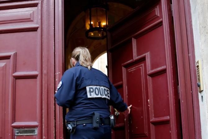 France begins formal probe in the robbery incident related to Kim Kardashian in Paris. In Picture: A police officer stands guard at the entrance of a luxury residence on the Rue Tronchet in central Paris, France, 3 October 2016 where masked men robbed US reality TV star Kim Kardashian West at gunpoint early on Monday, stealing jewellery worth millions of dollars, police and her publicist said. Kim Kardashian's Paris robbery