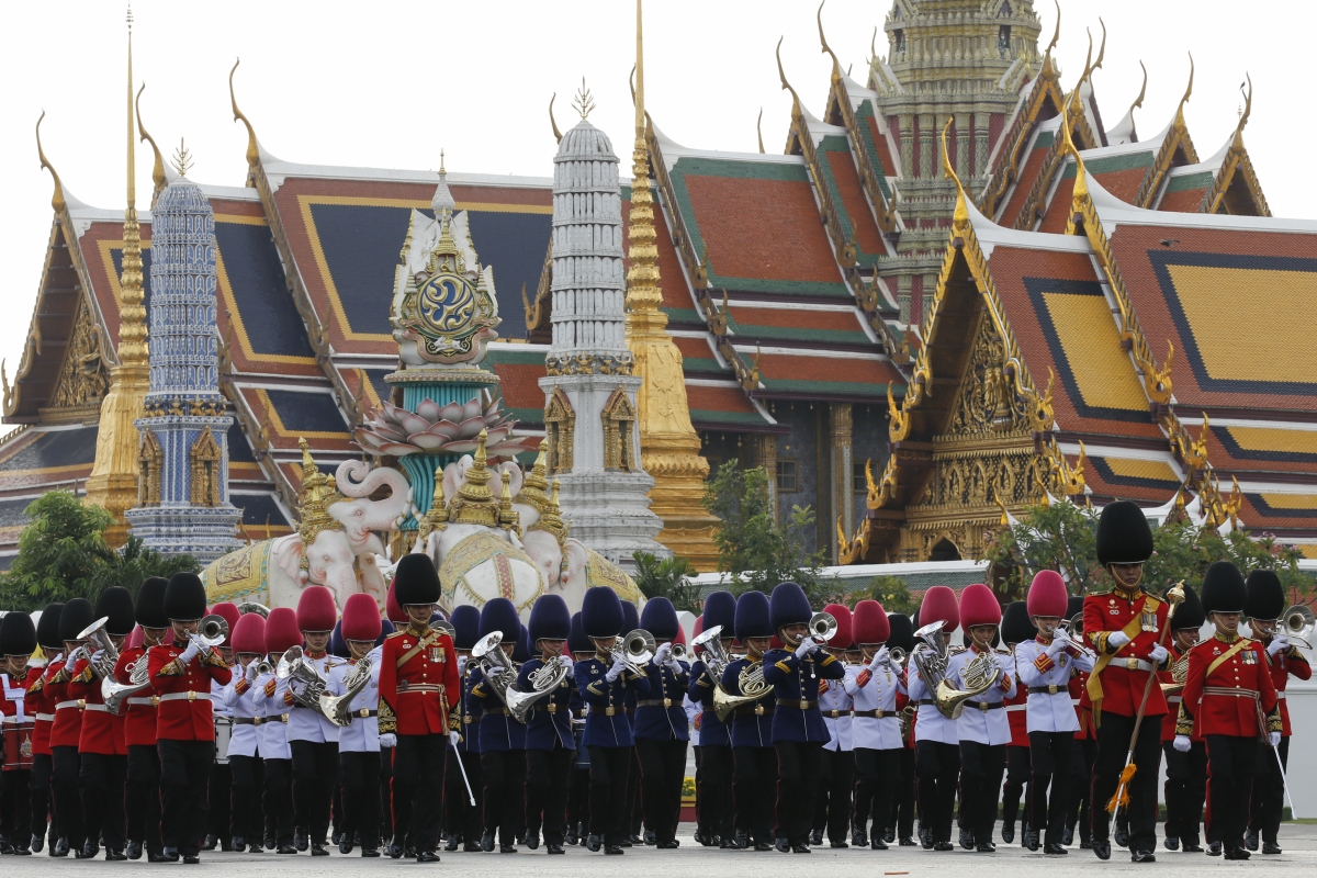 Thai Royal Guards march in front of the Grand Palace during a military parade as a part of a celebration of the upcoming birthday of the King Bhumibol Adulyadej in Bangkok December 3, 2015. The revered King, the world's longest-reigning monarch, passed away on Thursday. thailand tourism indian travellers wedding season planners phuket bangkok king death passes away Bhumibol Adulyadej
