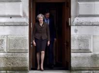 Theresa May to visit India