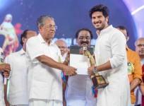 Dulquer Salmaan receives Kerala State Film Best Actor Award from Pinarayi Vijayan