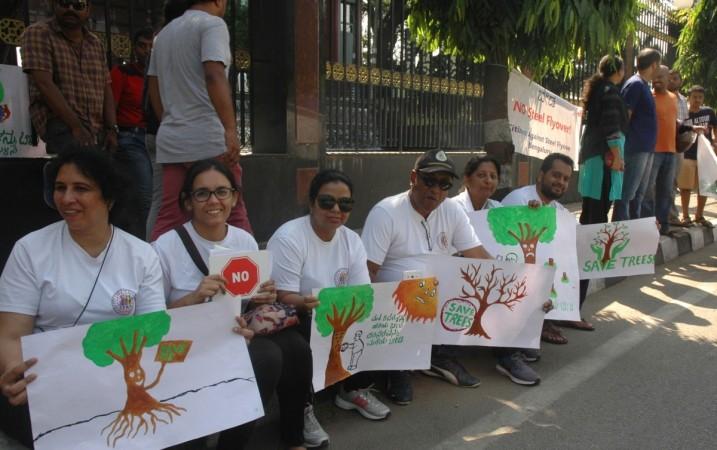 bengaluru bangalore steel flyover project trees axe 812 cost crore congress bjp harish bijoor citizens activists bcic