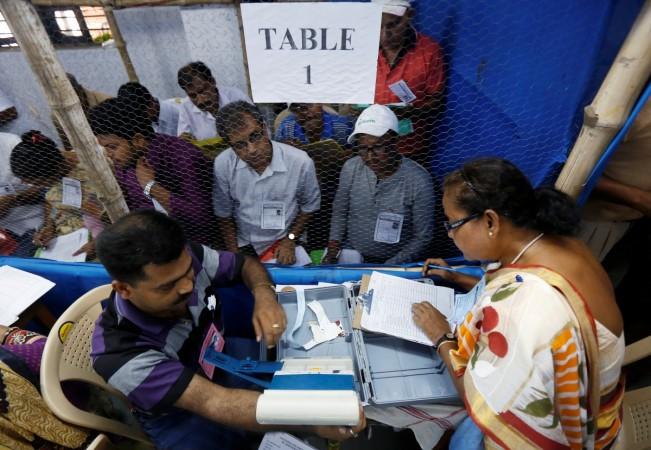 Election officials count votes in the West Bengal Assembly elections, at a counting centre in Kolkata, May 19, 2016. election in india