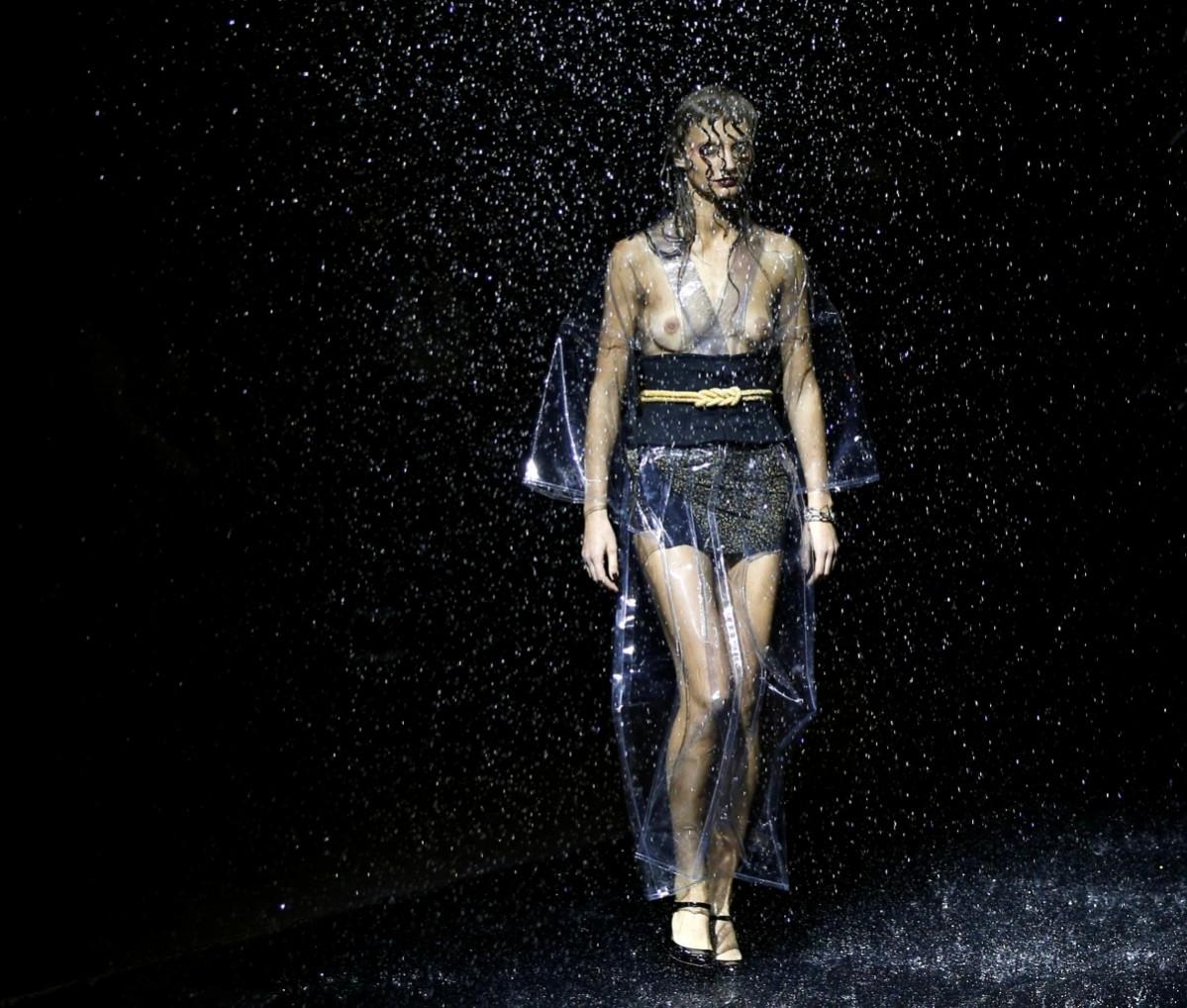 A model presents a creation by designer Yoshiki, leader of Japan's band Tokyo Fashion Week