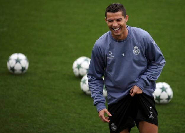 Real Madrid's Cristiano Ronaldo smiles during training session ahead of the Legia Warsaw game ronaldo