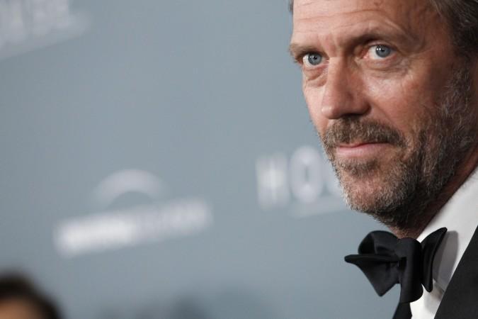 Cast member Hugh Laurie poses as he arrives at the series finale wrap party of the television series Hugh Laurie