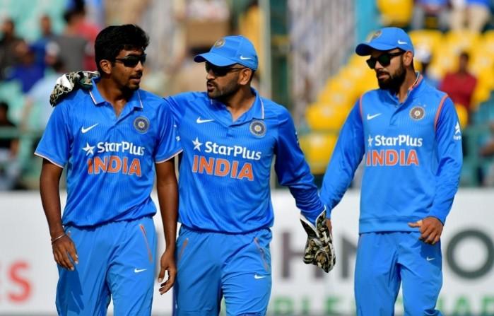 India players Jasprit Bumrah, MS Dhoni and Virat Kohli during the first one-day international against New Zealand, October 16, 2016 Jasprit Bumrah, MS Dhoni, Virat Kohli, India vs New Zealand