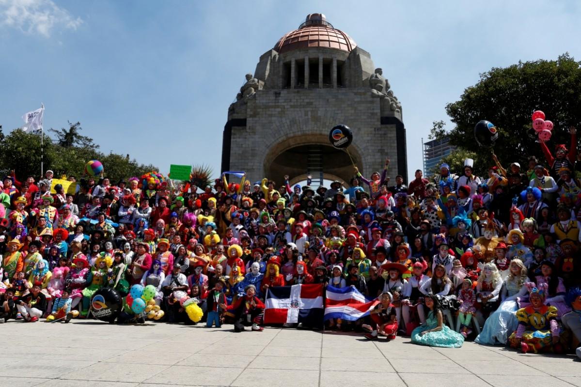 Clowns pose for the annual picture as part of the XXI Convention of Clowns, at the Monument to the Revolution, in Mexico City, Mexico, October 19, 2016. Convention of Clowns