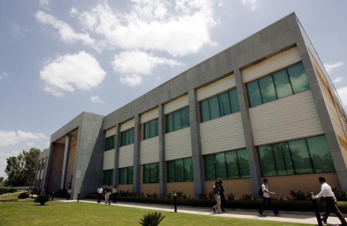 wipro q2 acquisition appirio results revenue net profit share price revenue guidance india sales premji azim bfsi retail attrition
