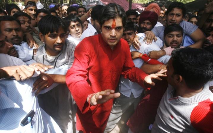 I didn't have access to defence secrets says Varun Gandhi Pictured: Varun Gandhi gestures as he arrives at a local court in Pilibhit, in Uttar Pradesh, March 28, 2009. varun gandhi