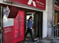 axis bank q2 share price essar group loans npas income private sector lender atm cyber security attack debit cards issues npas bad loans forex branches atms