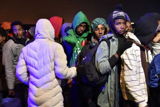 Calais Jungle: First migrants evacuated in week-long operation to clear camp