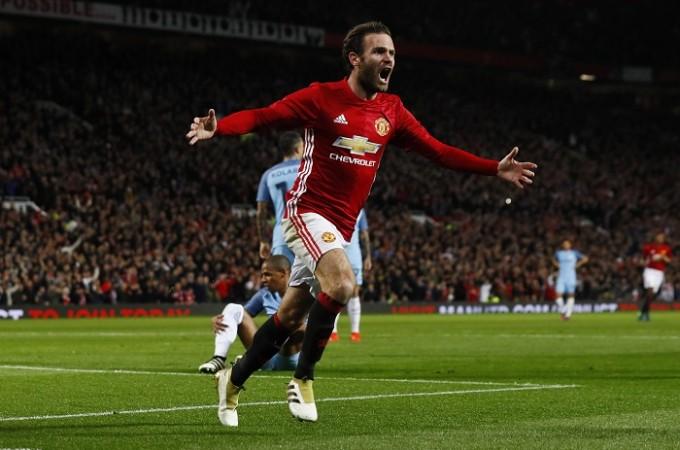 Manchester United playmaker Juan Mata celebrates after scoring the winner in the EFL Cup fourth round match against Manchester City, October 26, 2016 Juan Mata Manchester United Manchester City