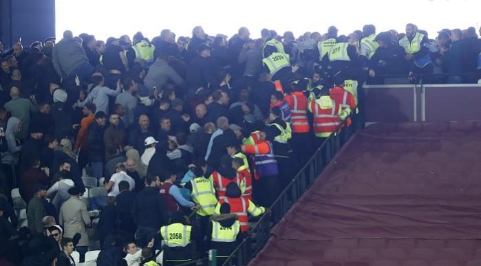 The stewards and security personnel struggled to keep the West Ham and Chelsea fans under check West Ham Chelsea fans