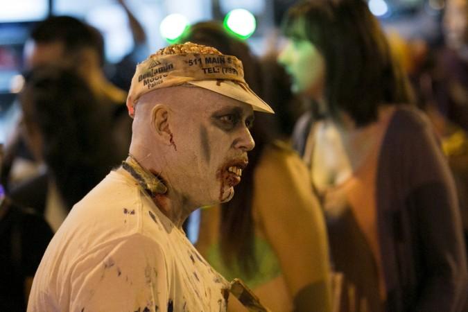 A man dressed as a zombie participates in the West Hollywood Halloween Costume Carnaval, which attracts nearly 500,000 people annually, in West Hollywood, California October 31, 2015 Halloween