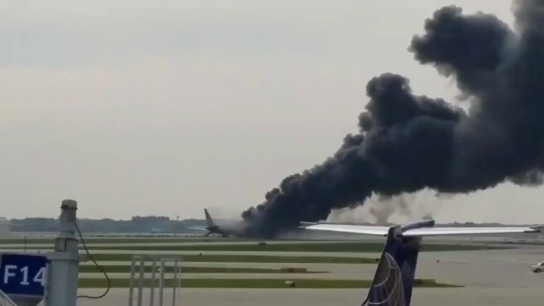American Airlines plane on fire at Chicago airport