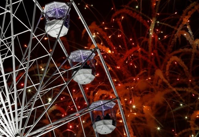 Fireworks explode over the Wheel of Light during Diwali celebrations in Leicester, Britain. Diwali 2016