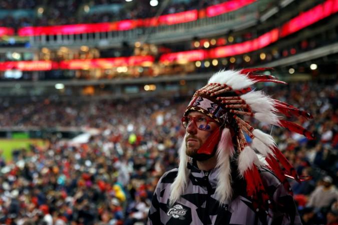 A fan of the Major League Baseball team Cleveland Indians watches their World Series game against the Chicago Cubs during a watch party inside Progressive Field in Cleveland, Ohio Cleveland Indians fan