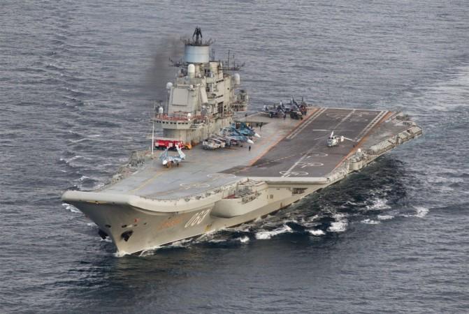 A photo taken from a Norwegian surveillance aircraft shows Russian aircraft carrier Admiral Kuznetsov in international waters off the coast of Northern Norway on October 17, 2016. Reuters Russian aircraft carrier Admiral Kuznetsov