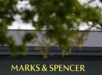 marks & spencer shuts shop uk stores overseas profit revenues retailer shopping clothes other products accessories perfume cosmetics garments food clothing