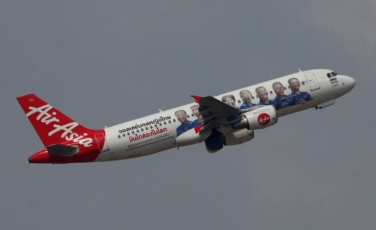 An AirAsia plane takes off from Kuala Lumpur International Airport, Malaysia August 28, 2016. airasia india cyrus mistry fraud tony chandilya mittu ceo fraud tata group ratan tata controversy rs 22 crore civil aviation business stake malaysia