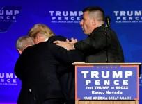 Donald Trump bundled off stage by secret service agents over gun scare