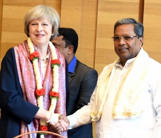 Prime Minister Theresa May AND Karnataka Chief Minister Siddaramaiah