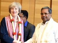 Prime Minister Theresa May AND  Karnataka Chief Minister Siddaramaiah