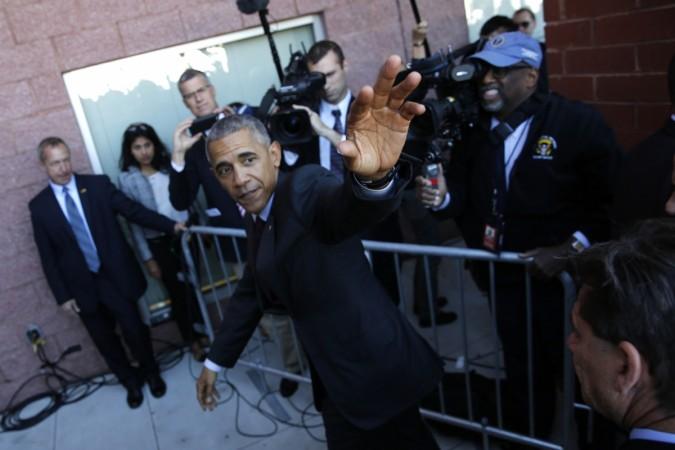 President Barack Obama greets people before delivering remarks at a Hillary for America campaign event at the Fayetteville State University in Fayetteville, North Carolina. Barack Obama
