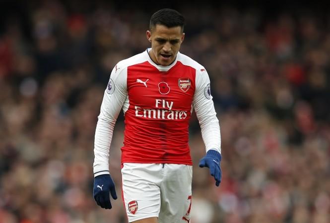 Alexis Sanchez could end up missing important games for Arsenal in November Alexis Sanchez Arsenal