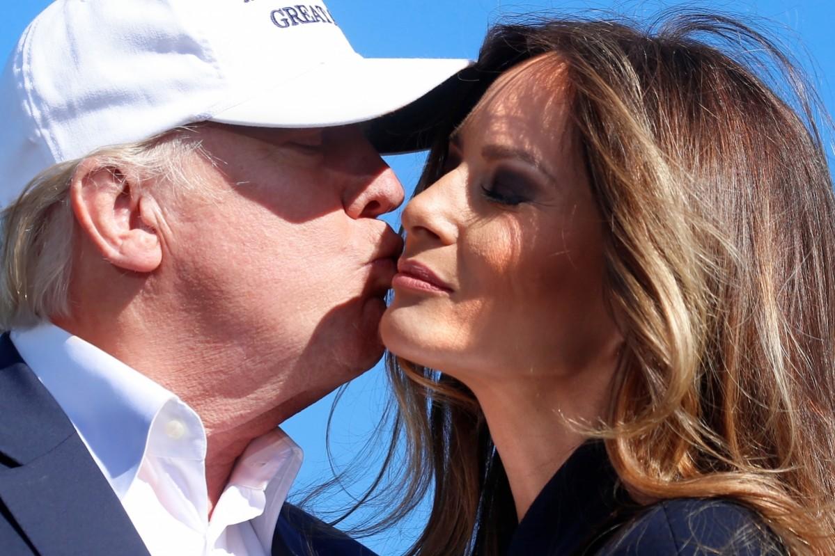 Donald Trump kisses his wife Melania Trump at a campaign rally in Wilmington, North Carolina Florida, U.S. November 5, 2016. Donald Trump