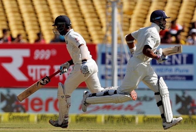 File photo of Cheteshwar Pujara (L) and Murali Vijay Pujara Vijay India