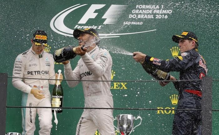 Nico Rosberg, Lewis Hamilton and Max Verstappen celebrate on the podium Rosberg Hamilton Verstappen