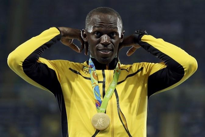 Usain Bolt already looks pretty good in yellow, so Borussia Dortmund should be a pretty good fit Usain Bolt Olympic medal