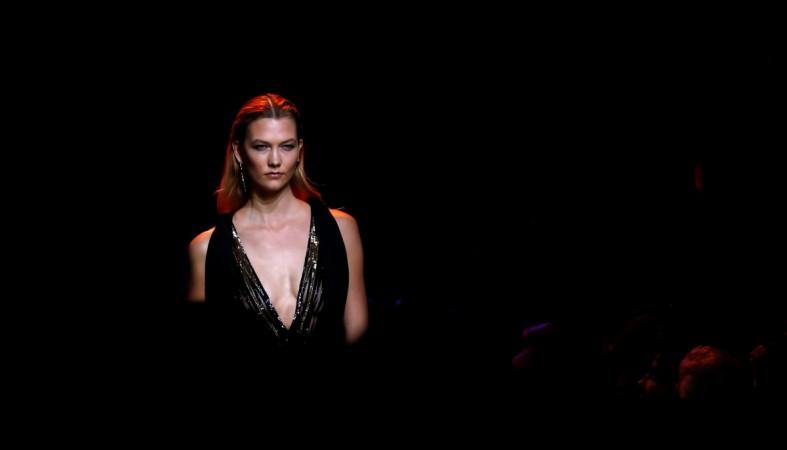 Model Karlie Kloss presents a creation by Lebanese designer Elie Saab as part of his SpringSummer 2017 women's ready-to-wear collection during Paris Fashion Week, France, October 1, 2016. Karlie Kloss