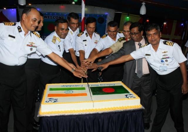 India to intensify its military ties with Bangladesh. In Picture: Indian Navy's Training Squadron Officers interacting with Bangladesh Navy Officers during a reception in Chittagong, Bangladesh. Indo-Bangladesh relations