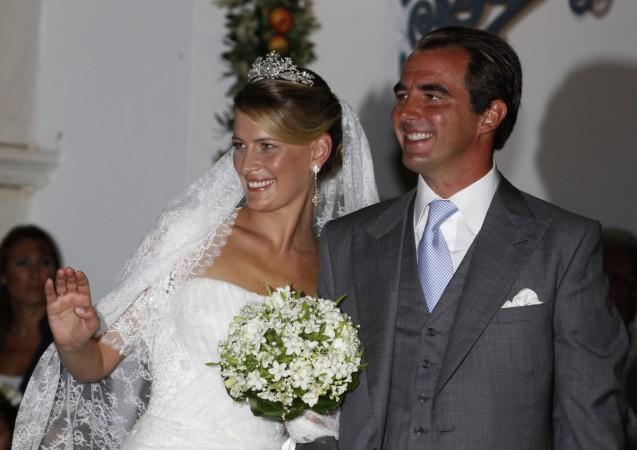 Prince Nikolaos, son of Greece's deposed King Constantine, and his bride Tatiana Blatnik leave Agios Nikolaos church after their wedding ceremony on the Greek island of Spetses August 25, 2010. Prince Nikolaos and Tatiana Blatnik