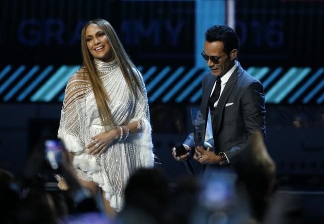 Jennifer Lopez and Marc Anthony react after kissing each other after she presented him with award honouring him as Latin Recording Academy person of the year at the 17th Annual Latin Grammy Awards in Las Vegas. Jennifer Lopez