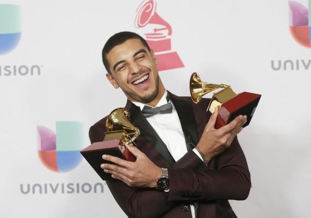 Manuel Medrano poses with his awards during the 17th Annual Latin Grammy Awards in Las Vegas. Manuel Medrano