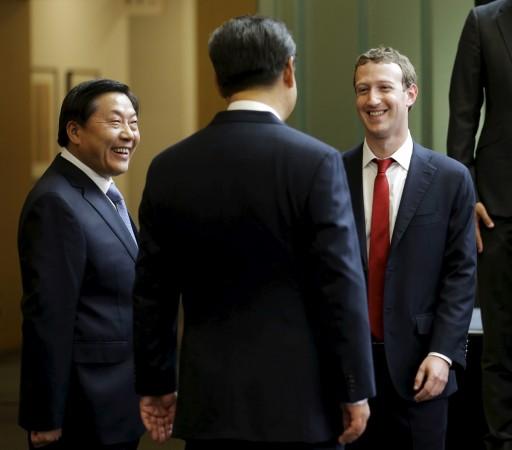 Facebook to get back into China? In Picture: Chinese President Xi Jinping (C) talks with Facebook Chief Executive Mark Zuckerberg (R) as China's top Internet regulator Lu Wei (L) looks on, during a gathering of CEOs and other executives at Microsoft's main campus in Redmond, Washington September 23, 2015. Facebook looking to get back into China?