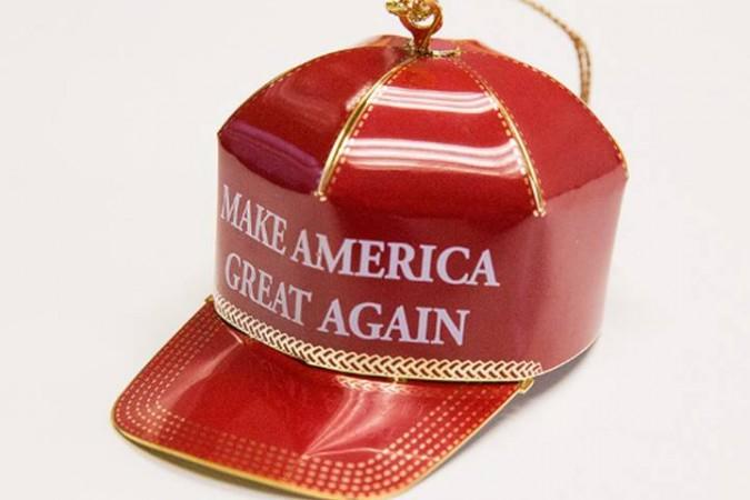 Image of the 'Trump Make America Great Again Red Cap Collectible Ornament'. Trump Amazon product